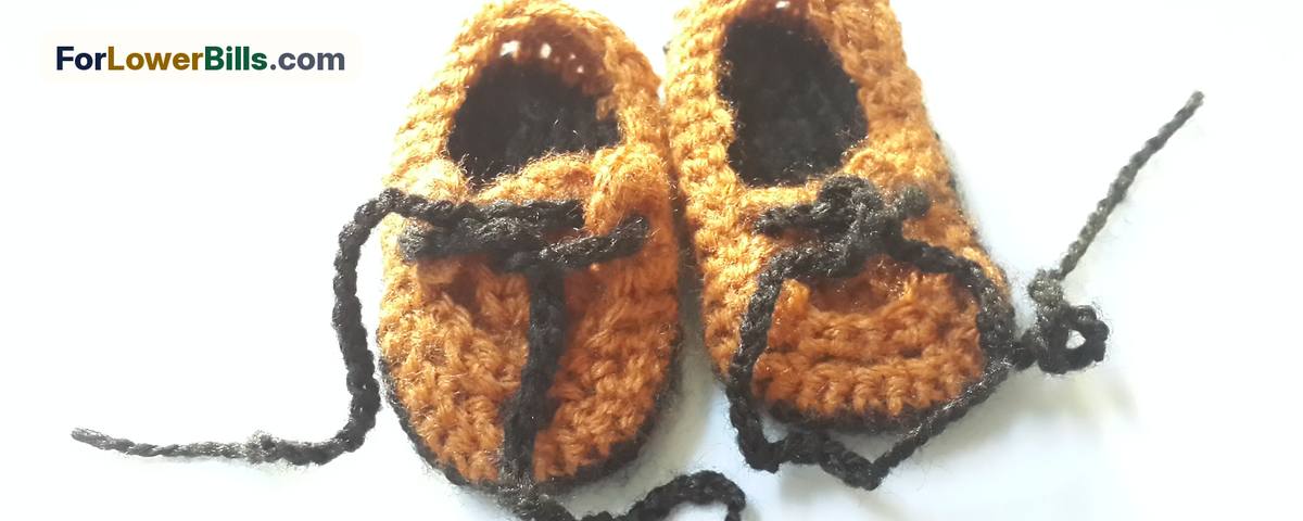 Pair of tiny knitted baby shoes