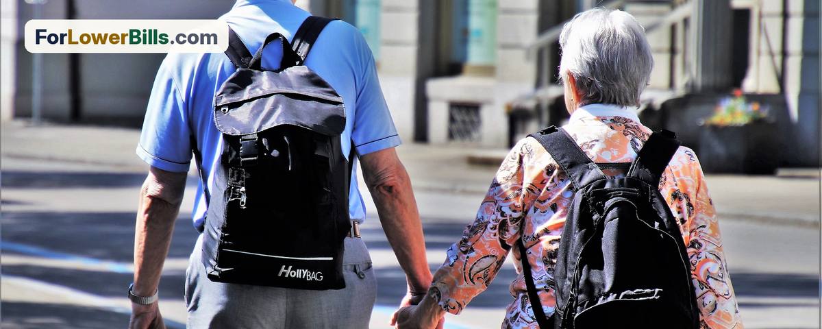 Older couple walking together outdoors
